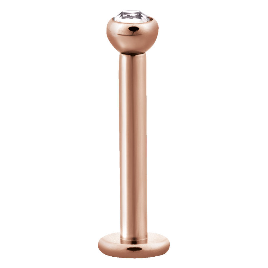 Labret in oro rosa in acciaio chirurgico con cristallo chiaro su sfondo bianco