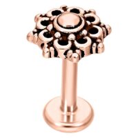 Mandala Labret con finitura in oro rosa su sfondo bianco