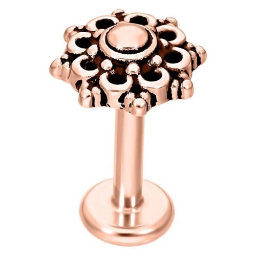 Mandala Labret con finitura in oro rosa su sfondo bianco