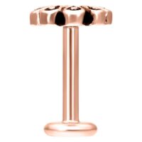 Labret in oro rosa con design floreale su sfondo bianco