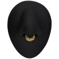 Clicker Septum dorato con motivo leopardato su sfondo nero