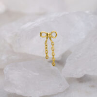 Ciondolo Push Fit dorato con fiocco Fiocco dorato con catena pendente su sfondo bianco