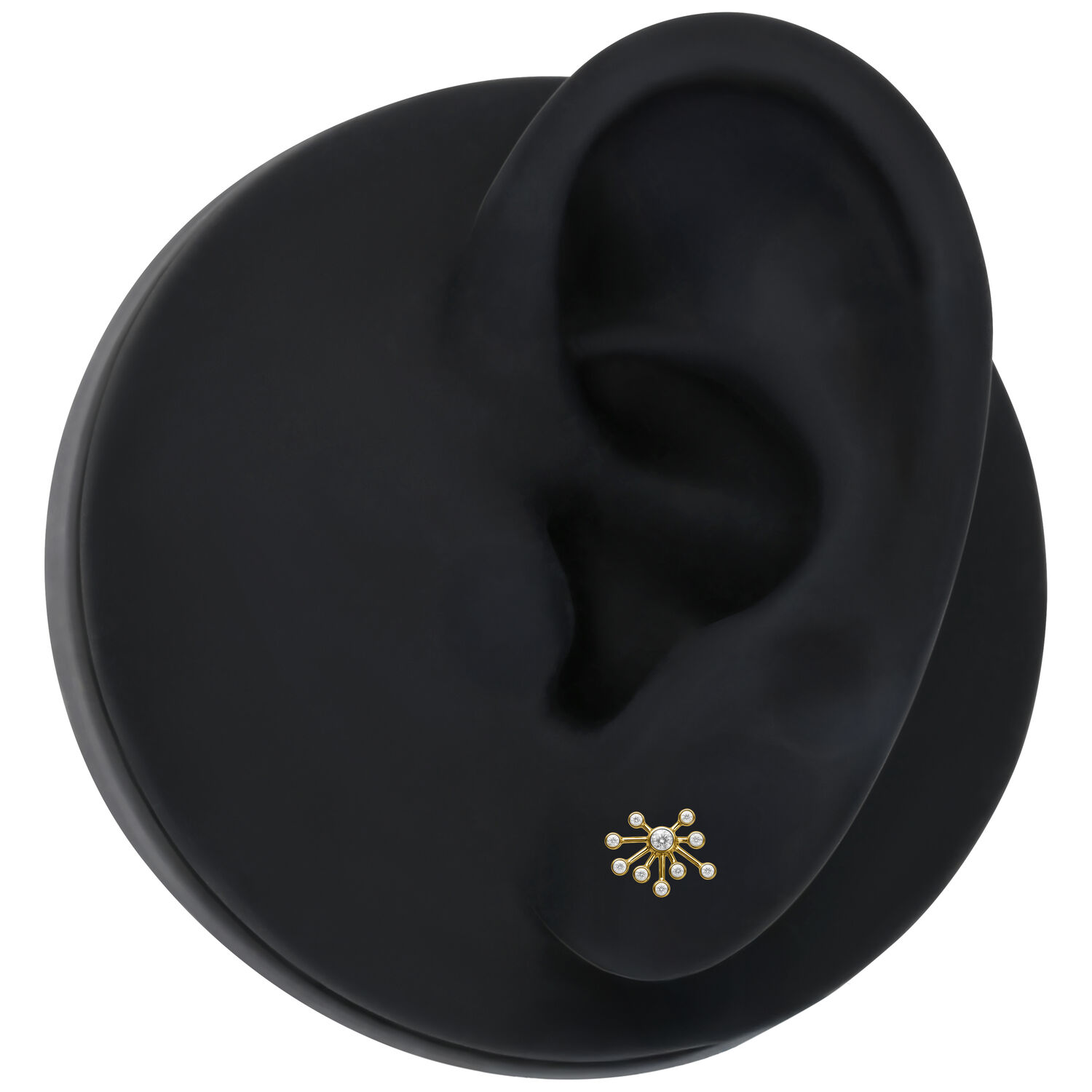 Inserto Push Fit dorato con cristallo Inserto dorato per piercing Push Fit con pietre cristalline su sfondo nero