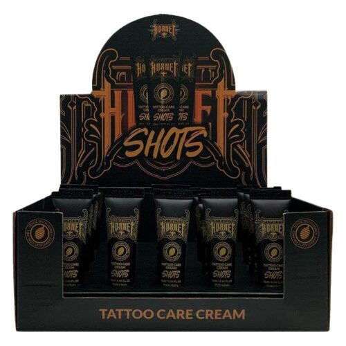 Scatola nera con Tattoo Cura Crema Shots, scritta decorativa, marchio Wildcat