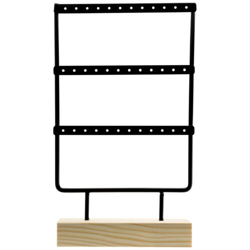 Supporto in metallo nero su base in legno chiaro, con fori per orecchini