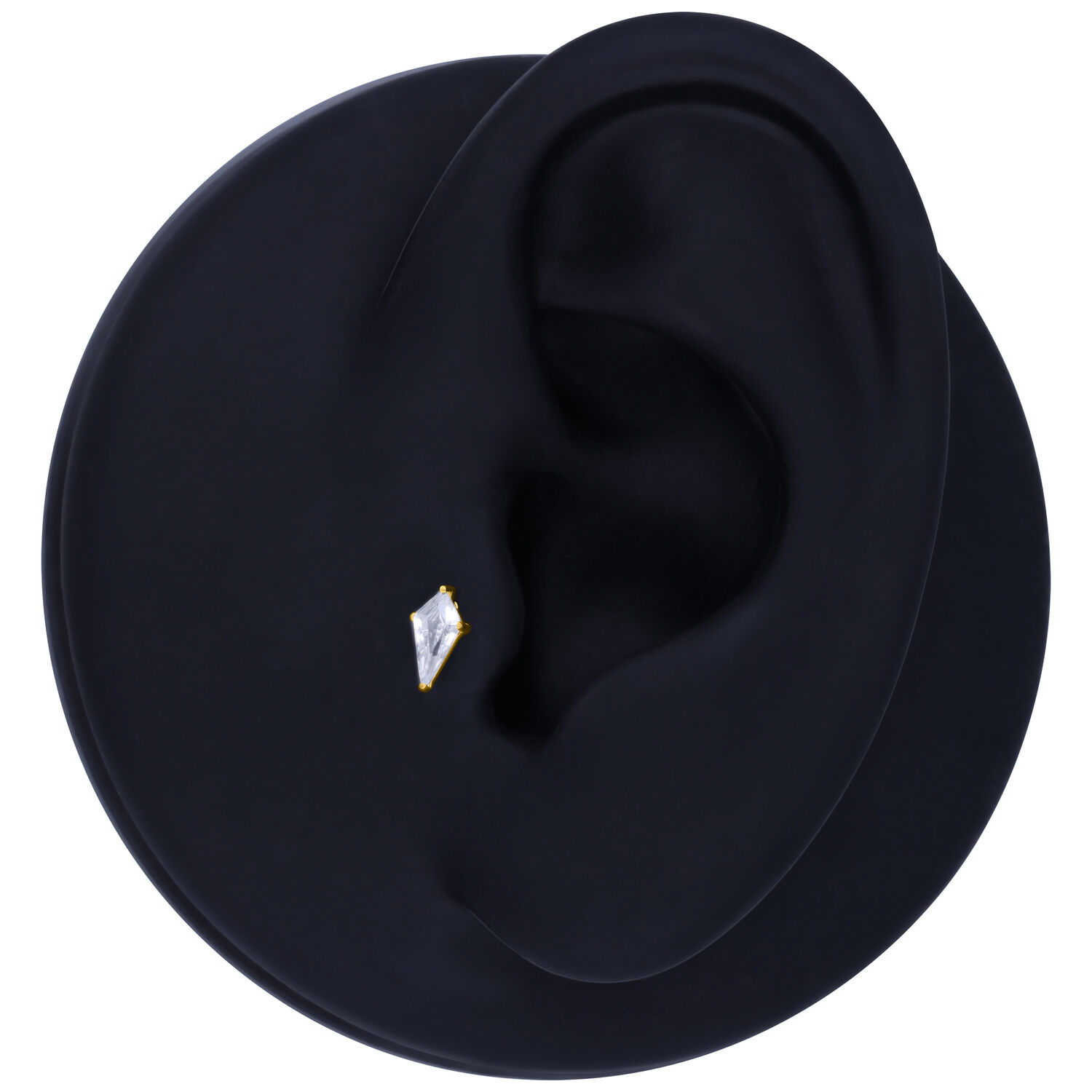 Cristallo dorato su sfondo nero, a forma di diamante.