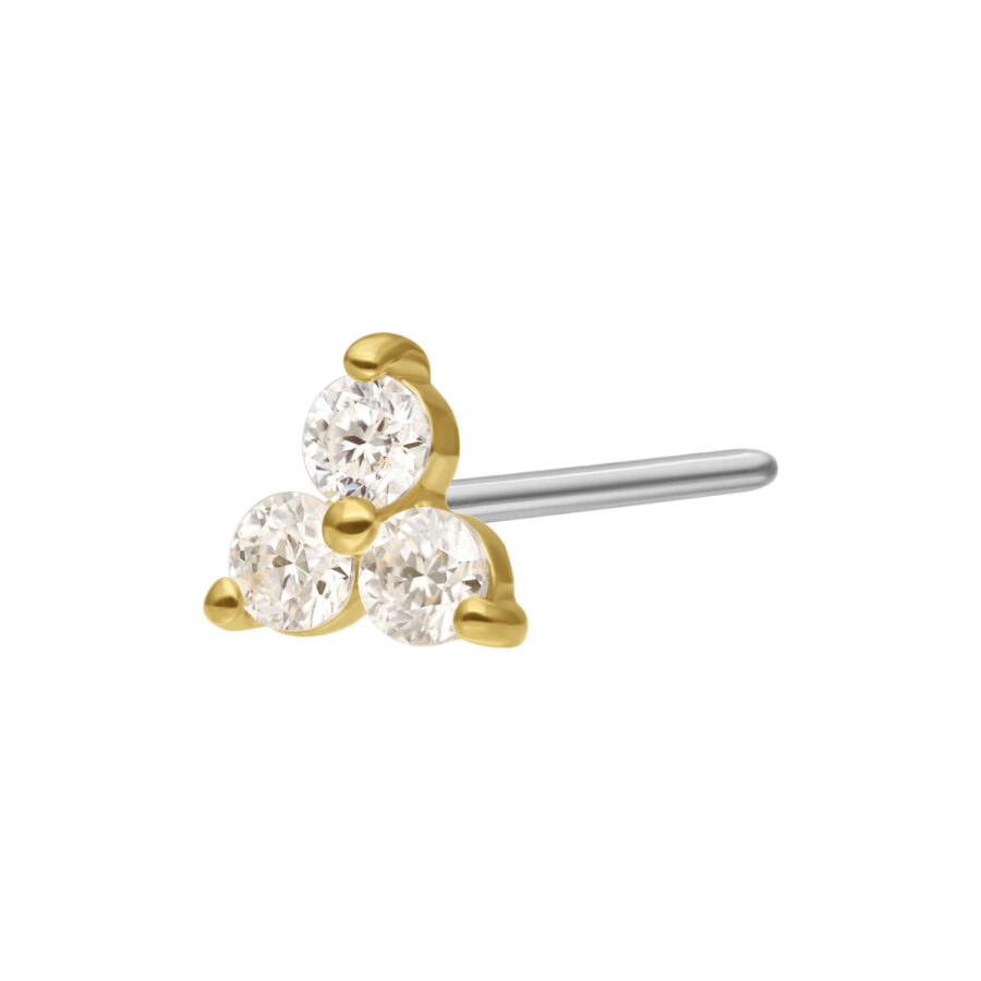 Punta push-fit dorata con tre cristalli chiari di moissanite su sfondo bianco