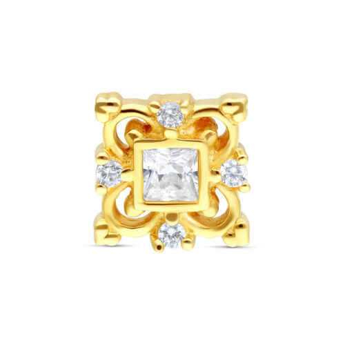 Decorazione dorata a forma di fiore con cristalli chiari su sfondo bianco