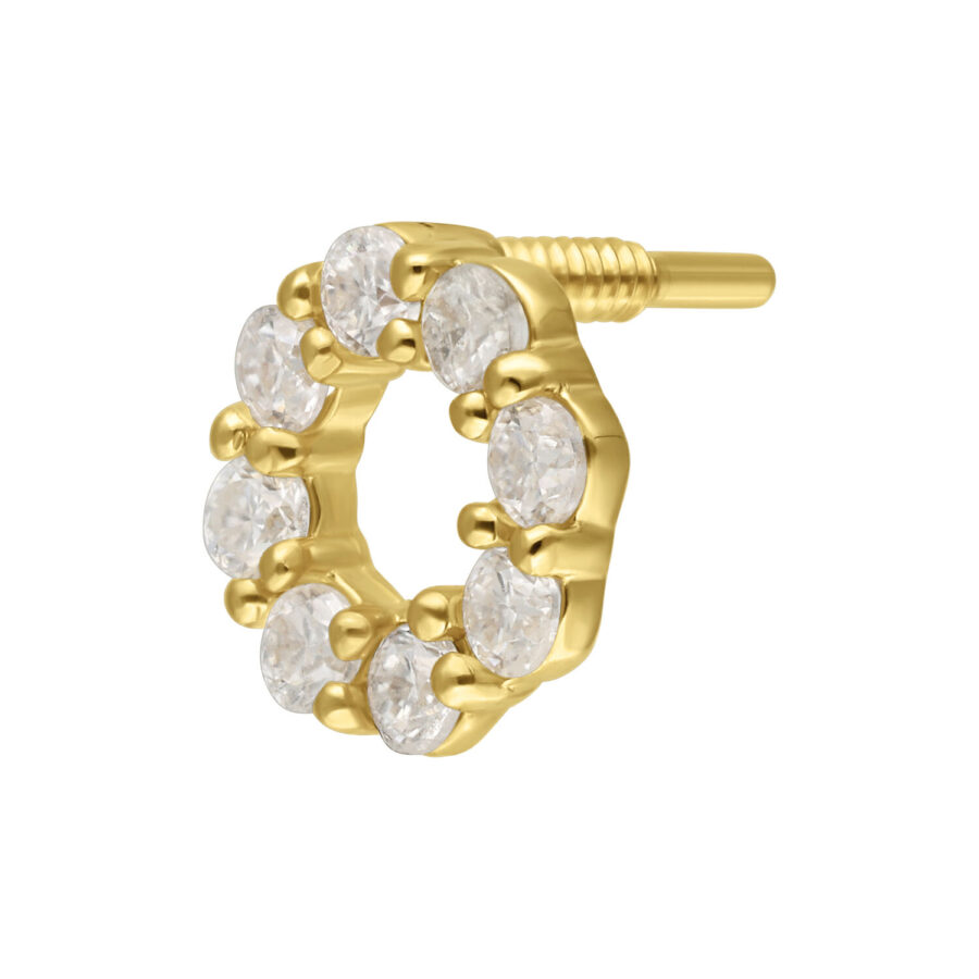 Inserto a corona dorata con pietre di moissanite su sfondo bianco