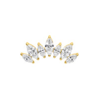 Punta per piercing in titanio dorato con sei cristalli chiari su sfondo bianco