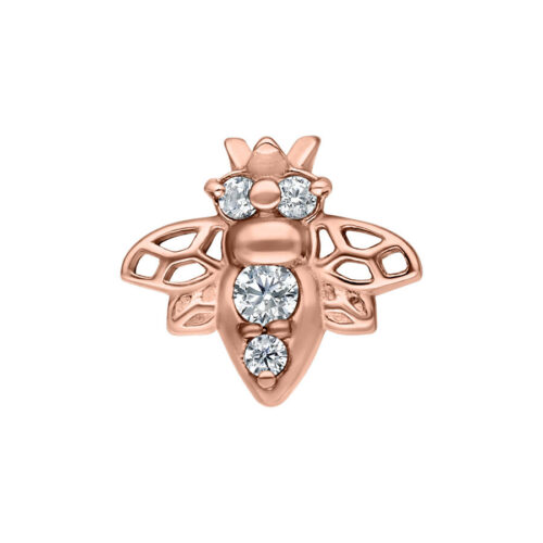 Attacco per piercing a forma di ape in oro rosa con cristalli chiari su sfondo bianco