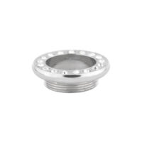 Accessorio in argento per piercing con cristalli chiari su sfondo bianco