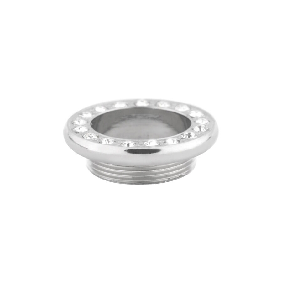 Accessorio in argento per piercing con cristalli chiari su sfondo bianco