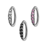 Tre Hinged Ring in argento con cristalli neri, chiari e rosa su sfondo bianco