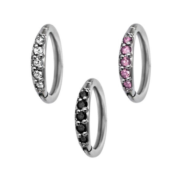 Tre Hinged Ring in argento con cristalli neri, chiari e rosa su sfondo bianco