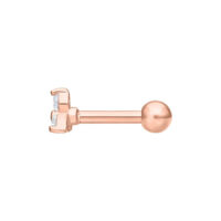 Barbell per orecchio in oro rosa con cristalli chiari su sfondo bianco