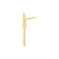 Accessorio piercing dorato con cristallo su sfondo bianco