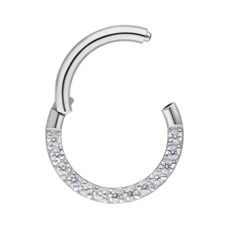 Clicker per setto in argento in acciaio chirurgico con cristalli chiari su sfondo bianco