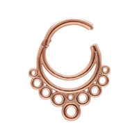 Clicker per setto in oro rosa con design a bolle su sfondo bianco