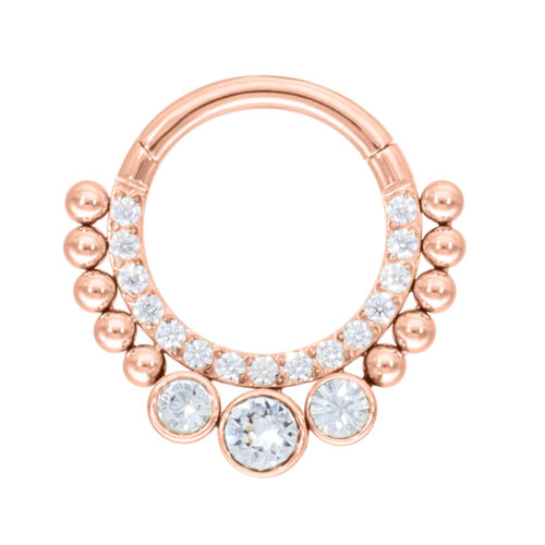 Clicker septum in rosé gold con cristalli chiari su sfondo bianco