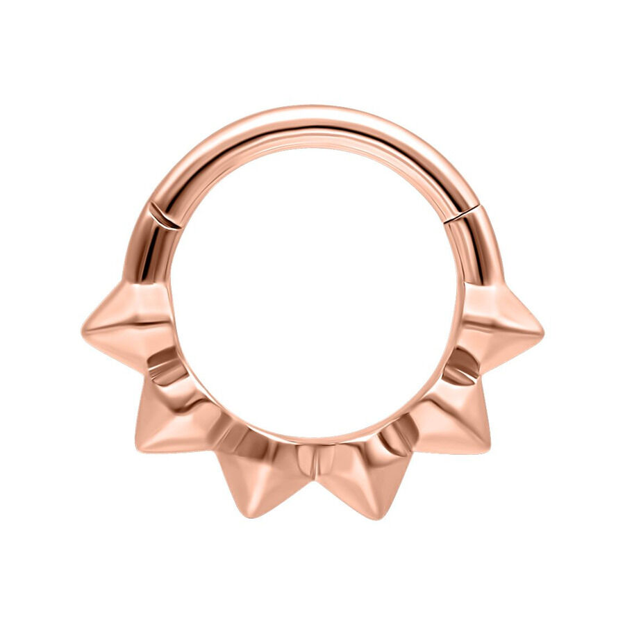 Anello piercing in oro rosa con spikes su sfondo bianco