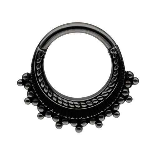 Anello piercing nero in acciaio chirurgico con sfere decorative su sfondo bianco