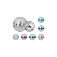 Punta piercing in argento con cristalli Punta piercing in argento con cristalli colorati su sfondo bianco