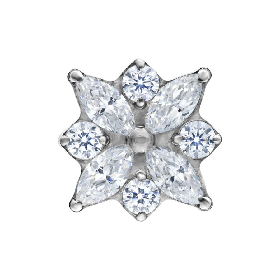 Top argento a forma di fiore con cristalli chiari su sfondo bianco