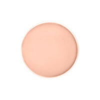 Disco rotondo in oro rosa su sfondo bianco