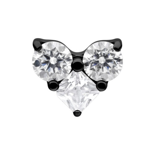 Accessorio in metallo nero con tre cristalli chiari su sfondo bianco