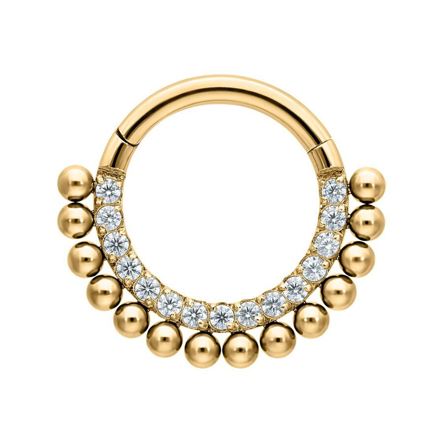 Anello piercing dorato con cristalli su sfondo bianco