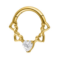 Clicker per setto dorato con cristallo a forma di cuore su sfondo bianco