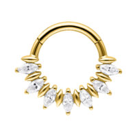 Clicker per setto dorato con scintillanti pietre marquise su sfondo bianco