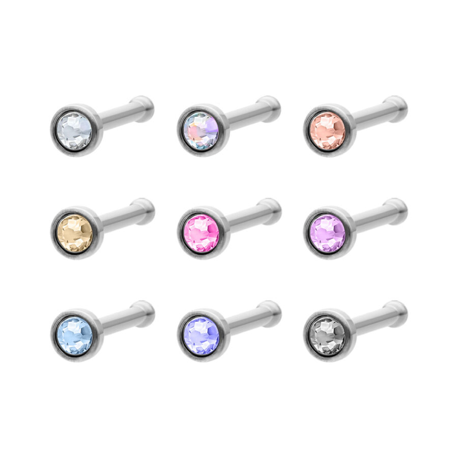 Piercing nasale in titanio argento con vari colori di cristallo su sfondo bianco