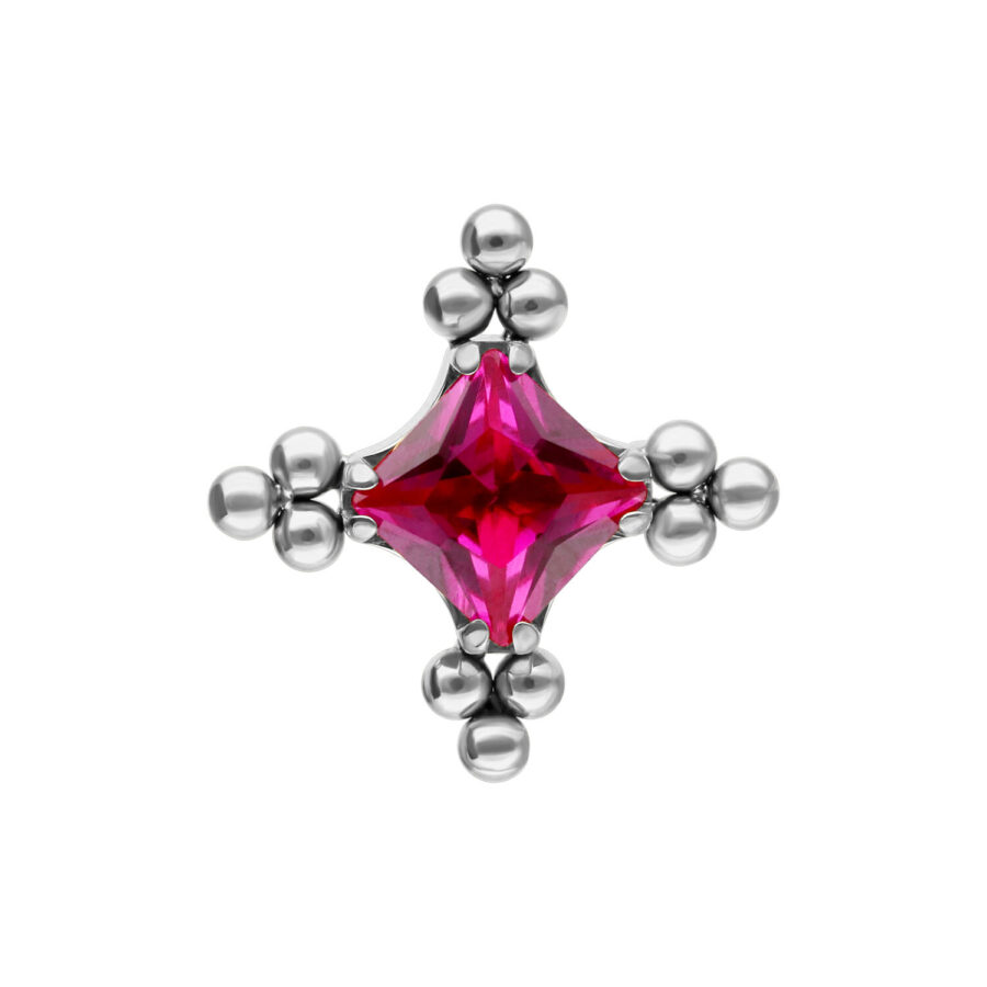 Accessorio argento con cristallo rubino e motivo a bolle su sfondo bianco