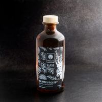 Wildcat Gin analcolico 0,35L bottiglia Bottiglia di vetro marrone con design Wildcat su sfondo scuro