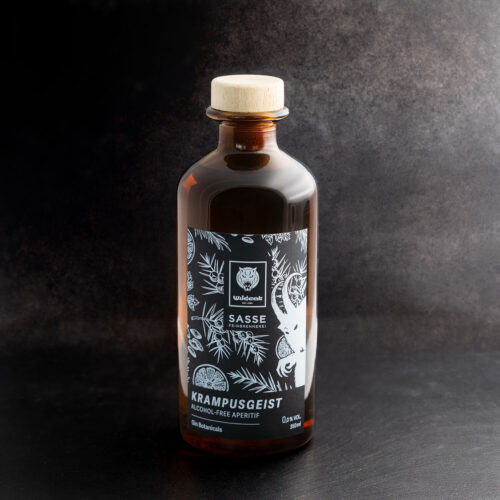 Bottiglia di vetro marrone con design Wildcat su sfondo scuro