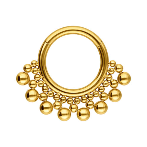 Clicker septum dorato con decorazioni a sfera su sfondo bianco