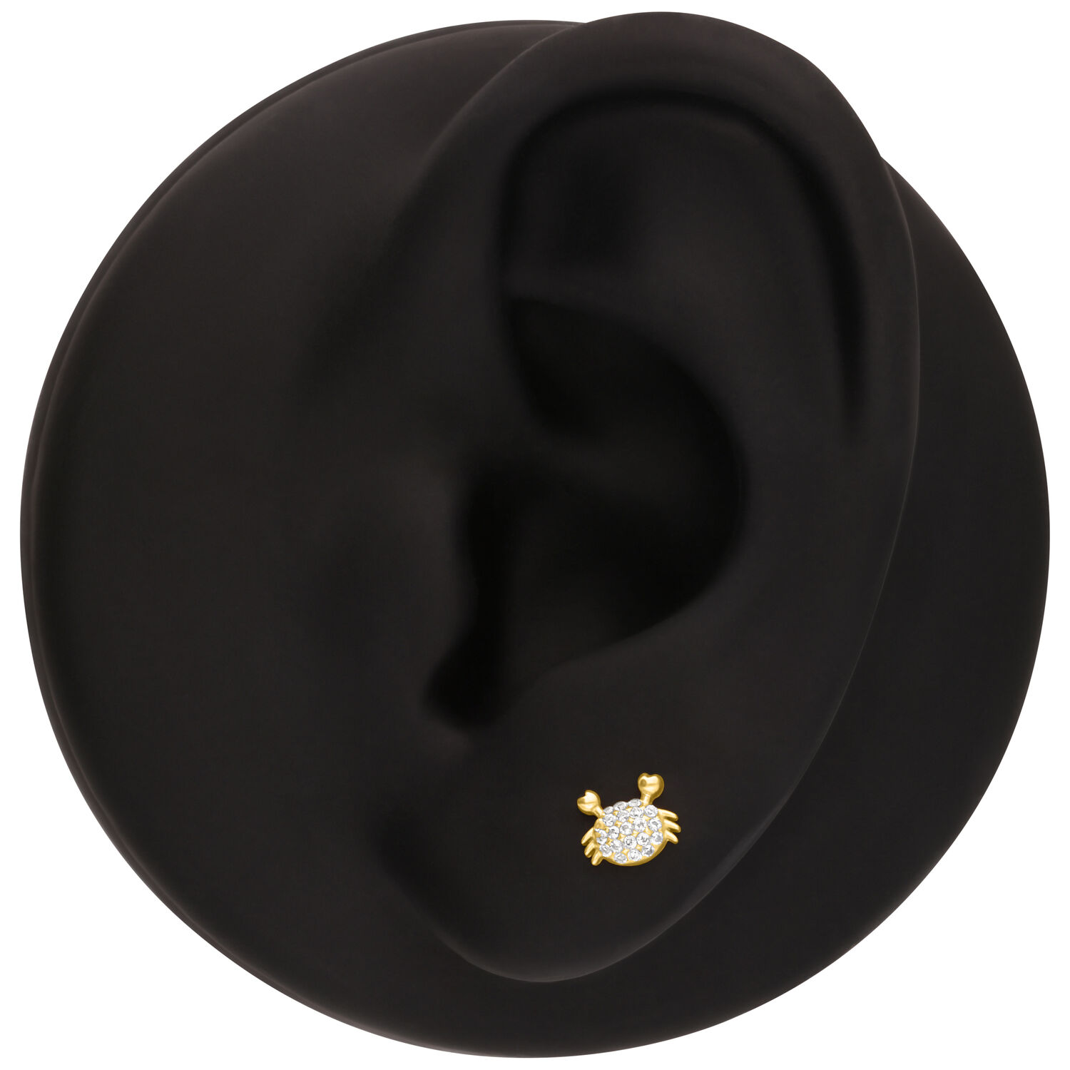 Accessorio a Pressione Granchio Dorato Accessorio granchio dorato con pietre scintillanti su un modello di orecchio nero