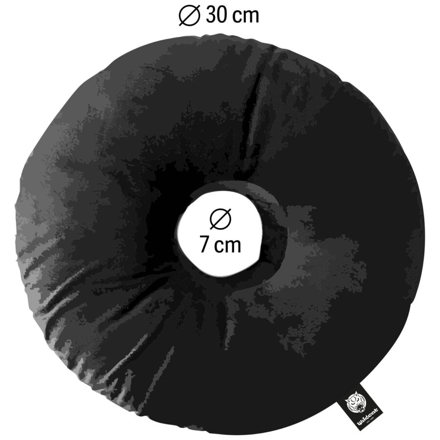 Cuscino rotondo nero per piercing in poliestere con diametro di 30 cm, etichetta con logo Wildcat visibile