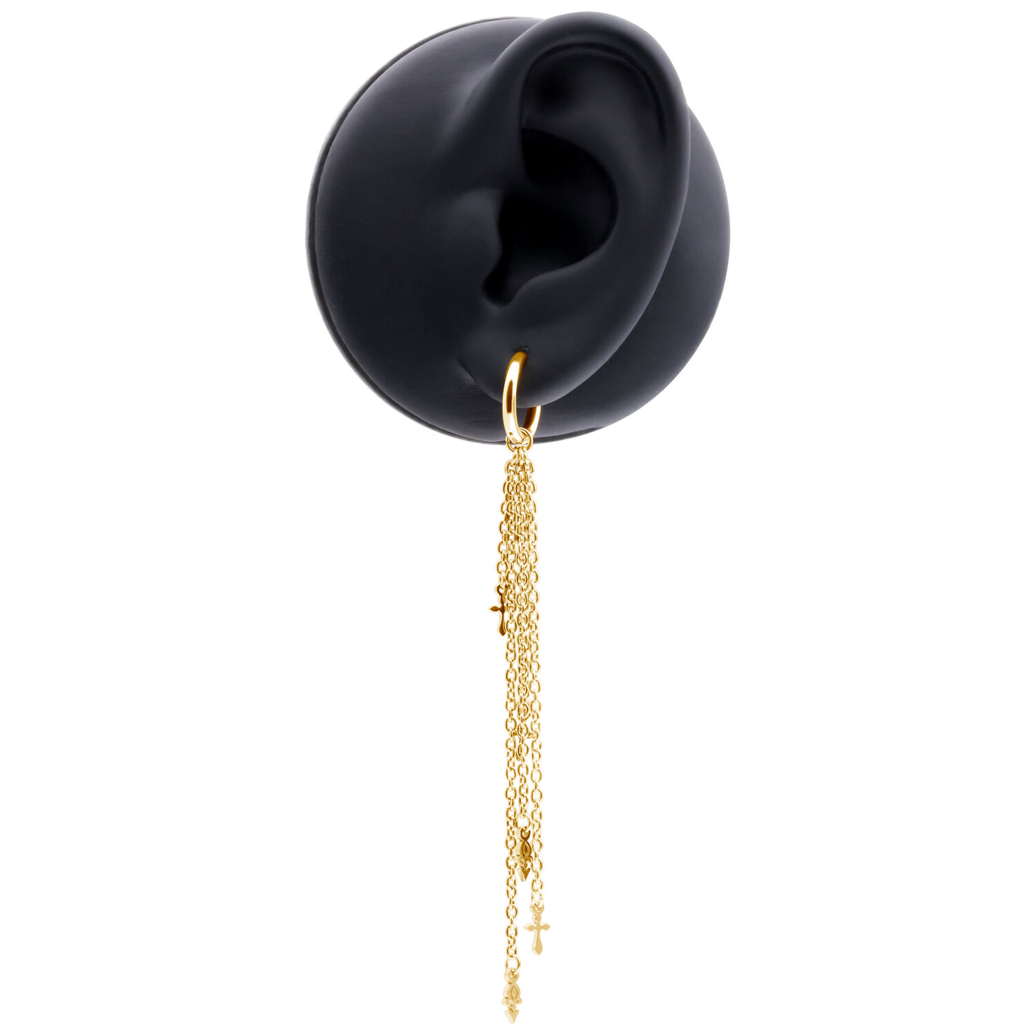 Orecchini d'oro con lunghe catenelle Orecchino d'oro con lunghe catenelle su un modello di orecchio nero