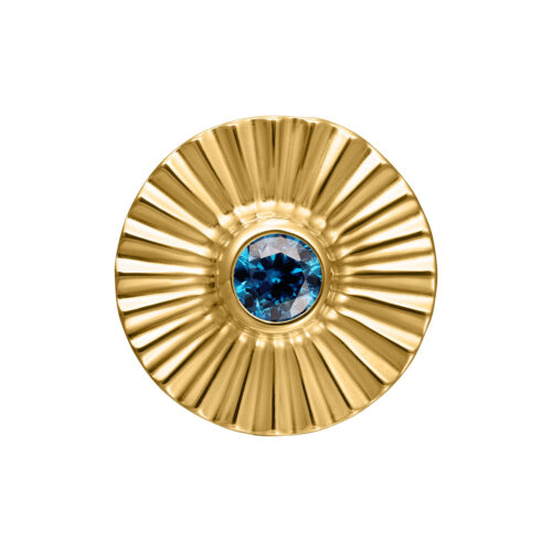 Accessorio dorato circolare con un cristallo turchese centrale
