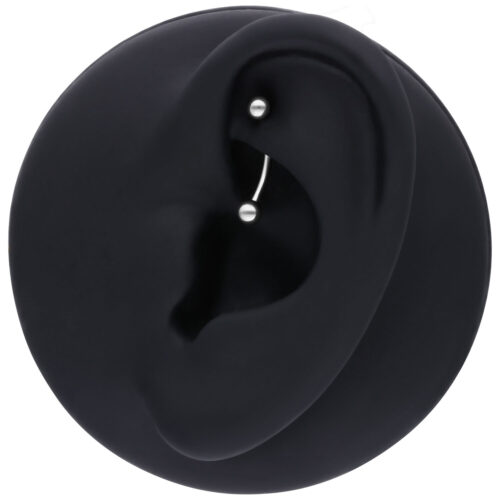Modello di orecchio nero con Micro Bananabell argento su sfondo bianco